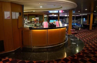 A semi-circular bar in the entertainment area on board the ferry.