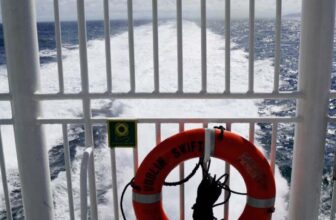 Gate at the rear deck, where you can watch the foaming seawater behind the ferry.