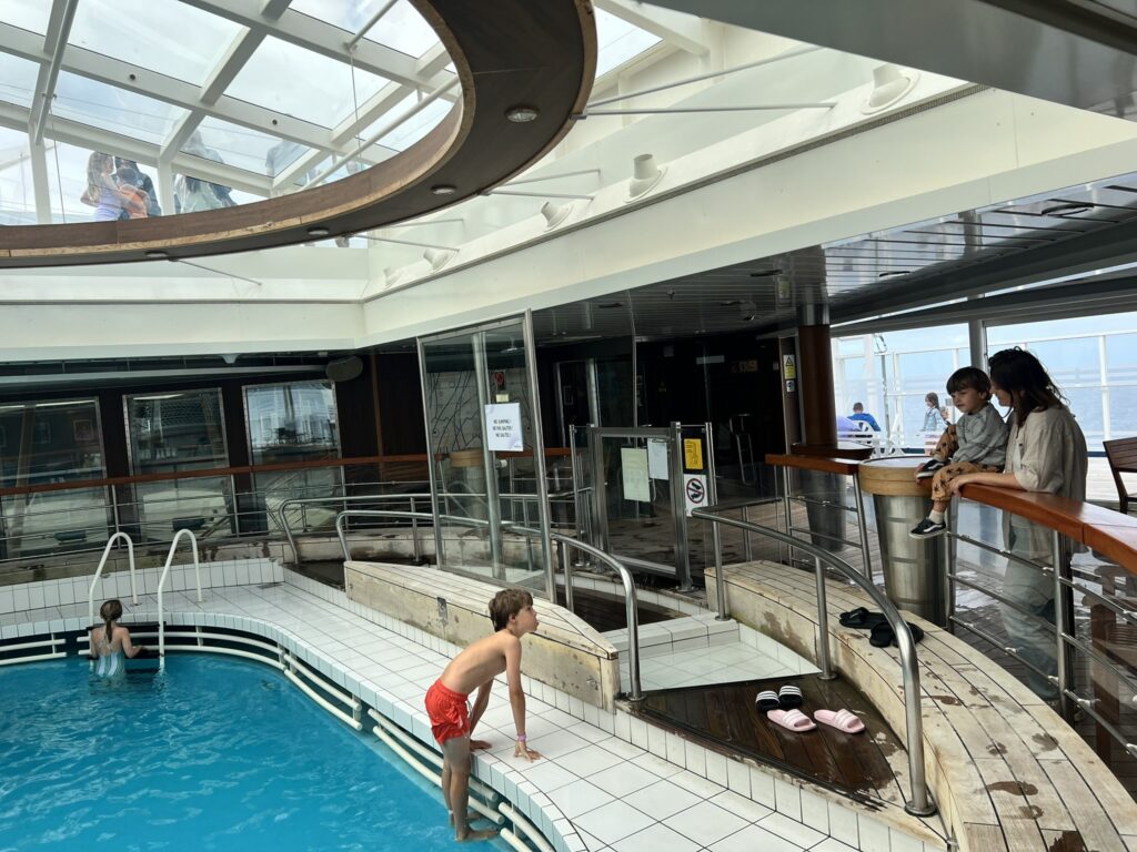 Children swimming in the pool aboard Pont-Aven