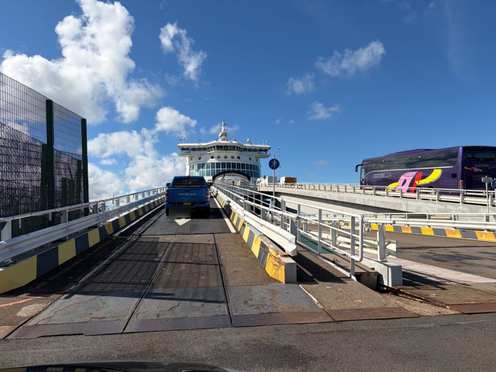 View from a car driving up the ramp towards Delft Seaways at Dunkirk, with a coach on the upper ramp